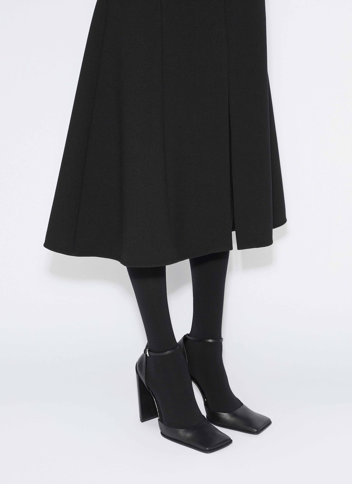STRETCH WOOL SLIT SKIRT ALAÏA BLACK STRETCH WOOL SLIT SKIRT